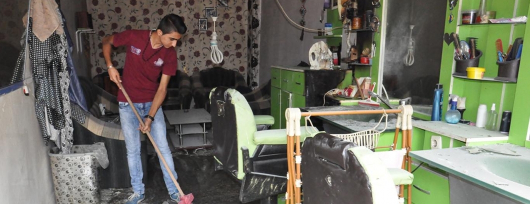 İş yeri yanan Suriyeli yardım istedi